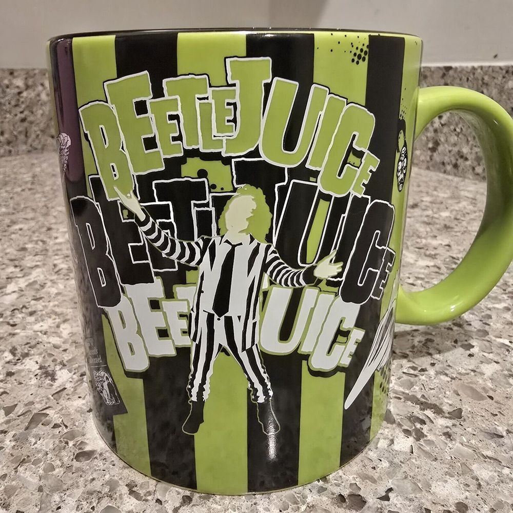 Beetlejuice Green & Black 20 oz Mug‎ with Beetlejuice Logo.